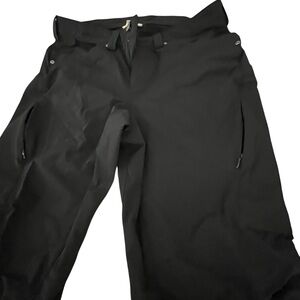 Duluth Trading Co. size 12 black hiking pants 
Stretch zip pockets on hips